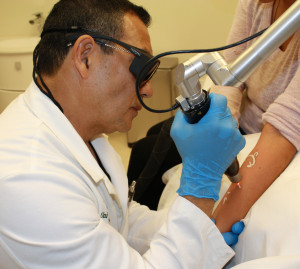 Dr. Hector Lalama removing a tattoo with the Picosure laser